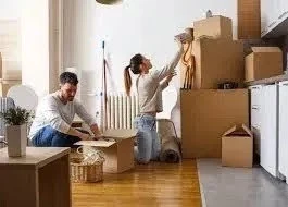 Family moving into a new home in Leicester, showcasing excitement and new beginnings